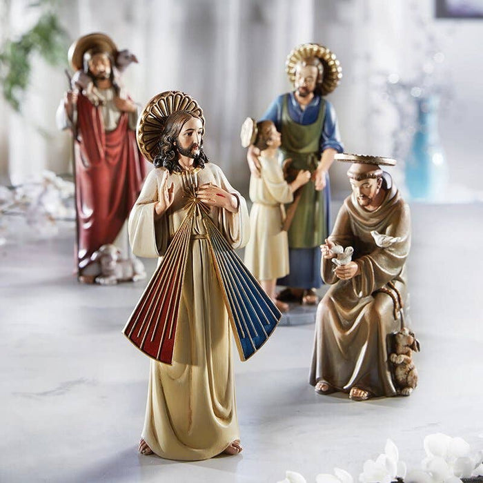 4 statues on table