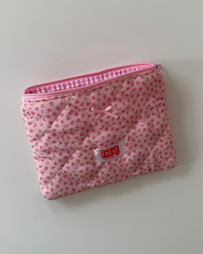 Pink bow makeup bag