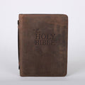 Brown leather Bible cover on white background