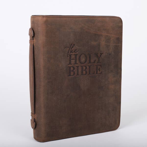 Brown leather Bible cover on white background