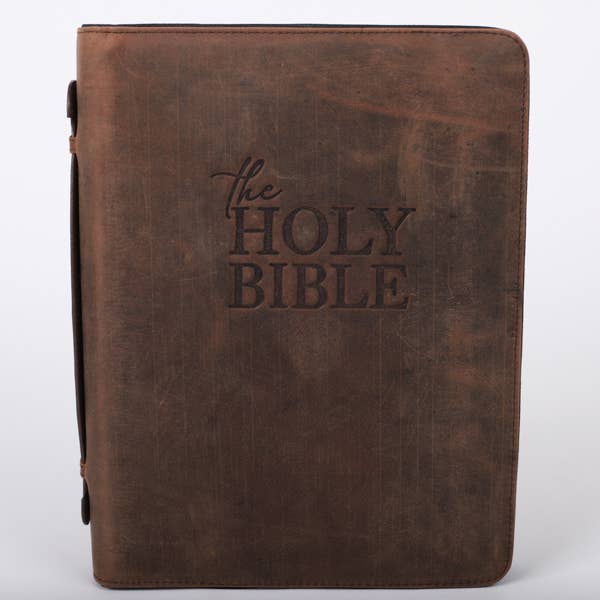 Brown leather Bible cover on white background