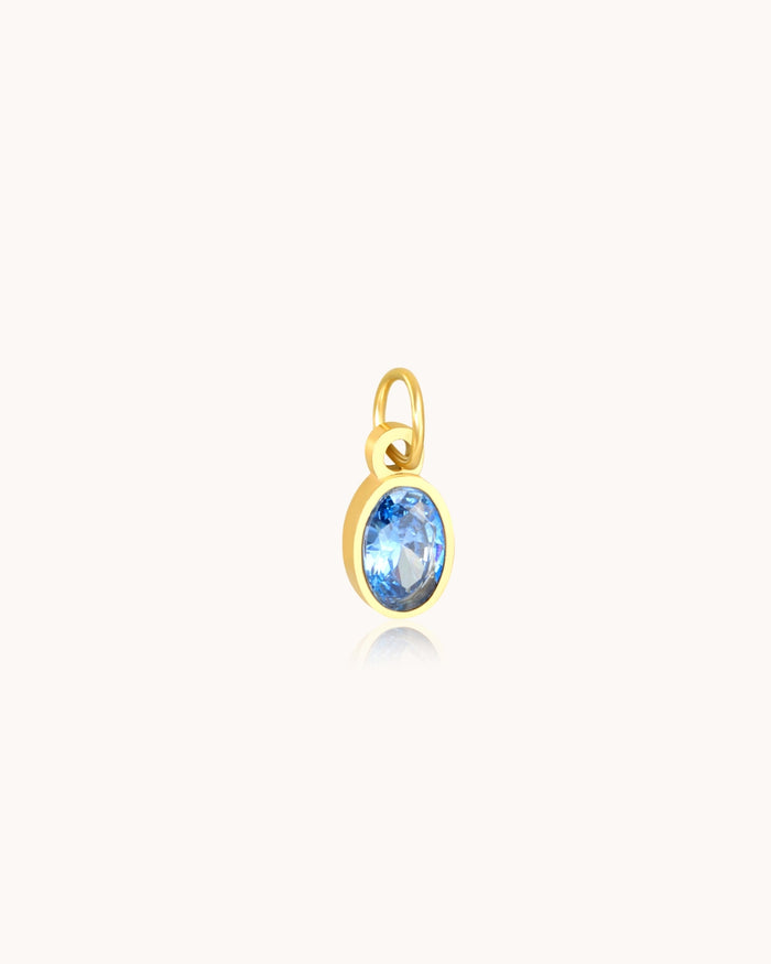 Blue stone charm