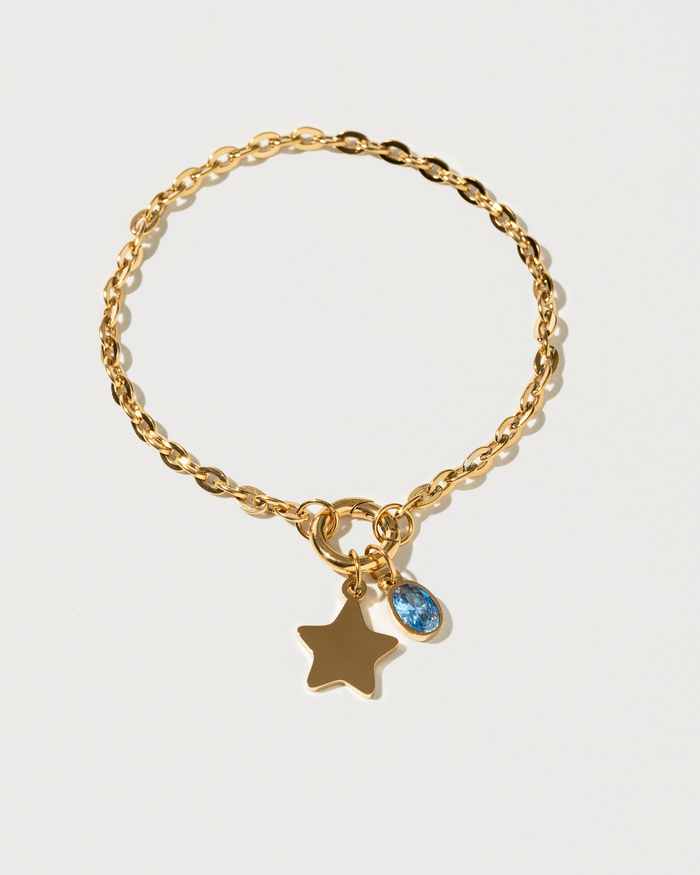 Blue stone charm