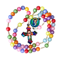 Colorful rosary with multicolored beads and a religious figure pendant on a white background