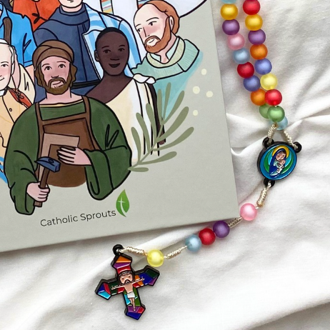 Colorful rosary with cartoon characters on a white background