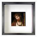 Framed artwork of a religious figure with a black frame on a white background