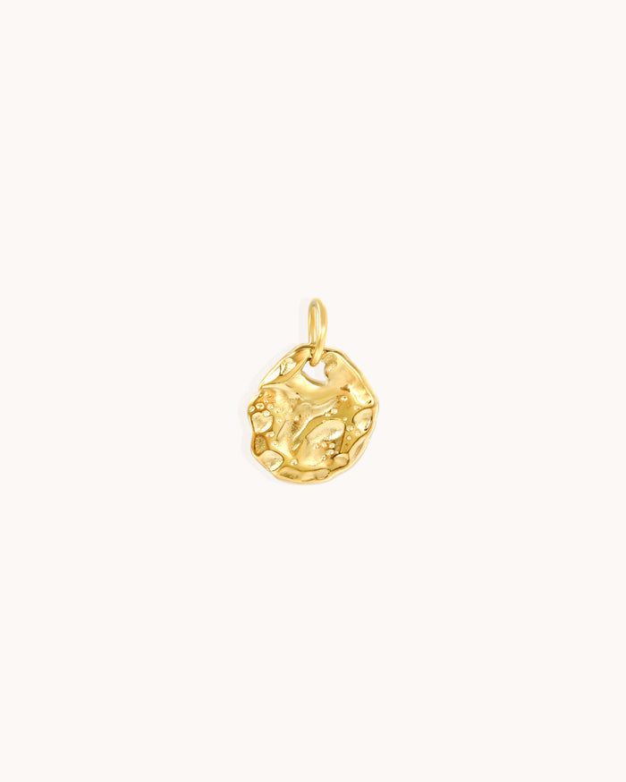 Flat hammered charm
