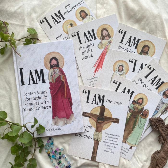 Lenten study book for Catholic families with young children on a textured surface with greenery.