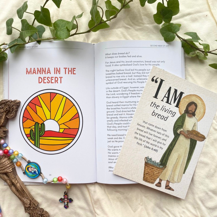 Open book with 'Manna in the Desert' illustration and a book with Jesus holding bread, surrounded by greenery and a cross.