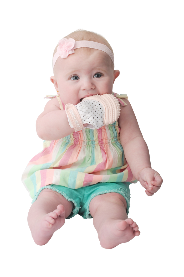 Munch Mitt Teething Mitten - Hearts - Pastel Pink.