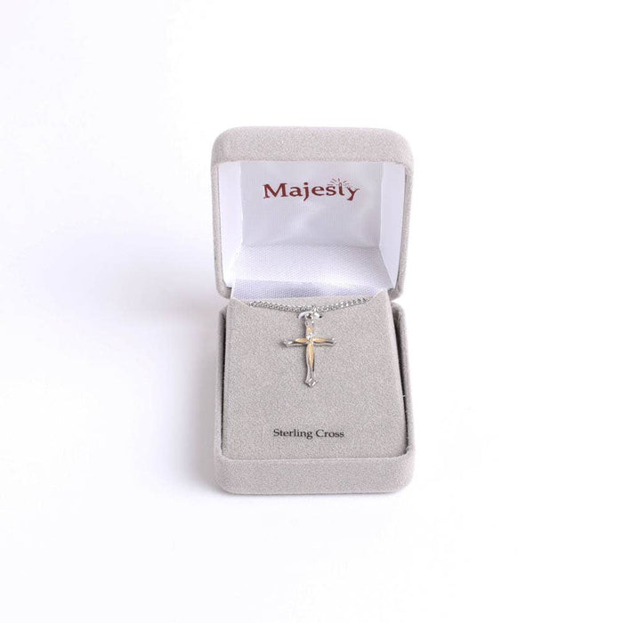 Cross necklace in a 'Majesty' jewelry box on a white background