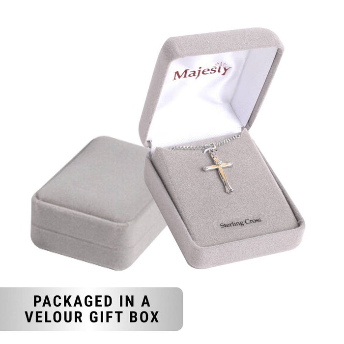 Silver cross necklace in a 'Majesty' branded velour gift box on a white background