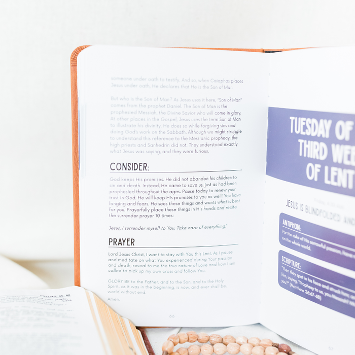 Open book with text and a prayer on a white background