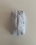 Striped blue makeup bag