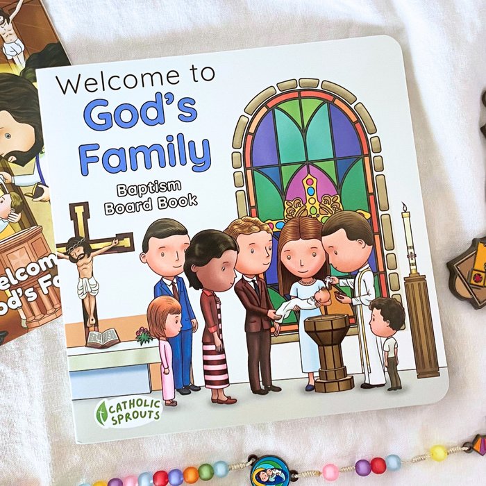 Board book titled 'Welcome to God's Family' by Catholic Sprouts on a white surface.