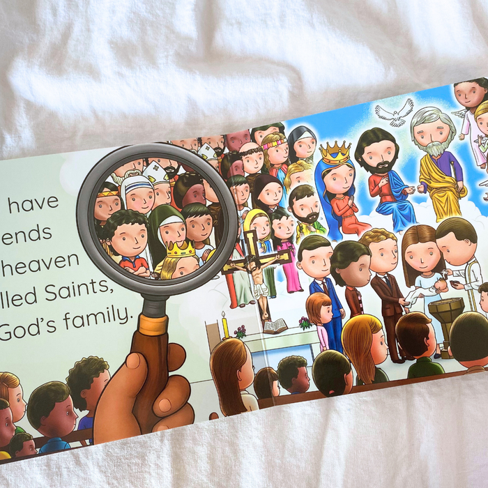Illustrated book page with a magnifying glass over a group of people, on a white fabric background.