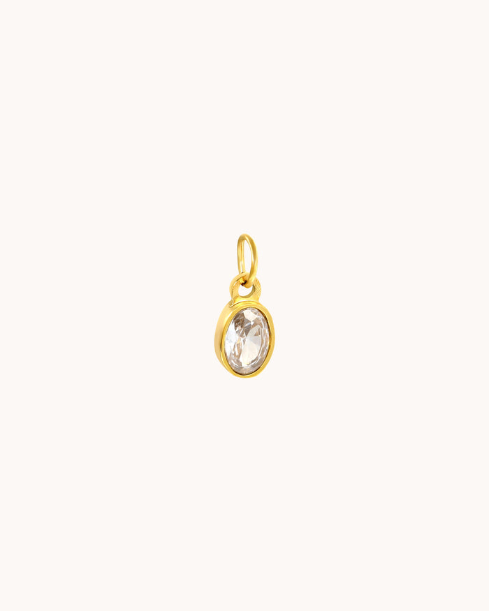 White stone charm