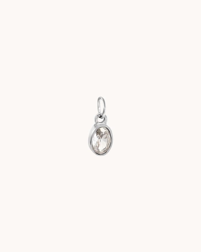 White stone charm